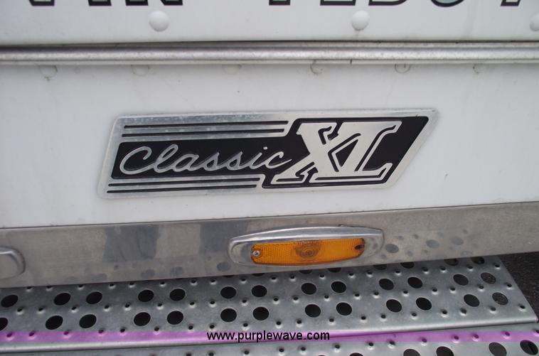 image for item 5756 2000 Freightliner FL132 Classic XL semi truck