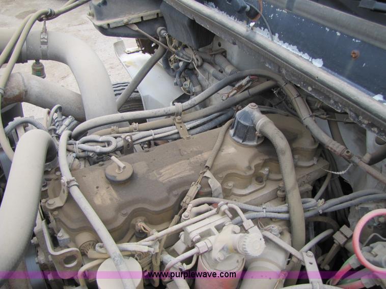 image for item 8415 1999 Freightliner FL80 Contractor dump bed truck