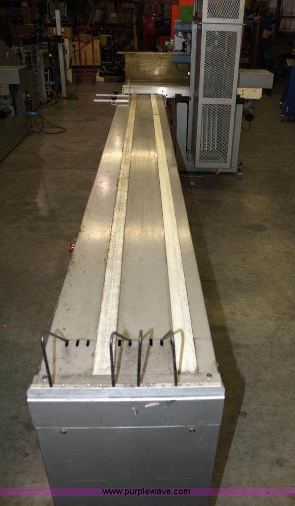 image for item 4899 Kirk-Rudy NetJet inkjet addressing system with dryer/heater, 12" conveyor, quarter folder, ramp stacker and ink management system