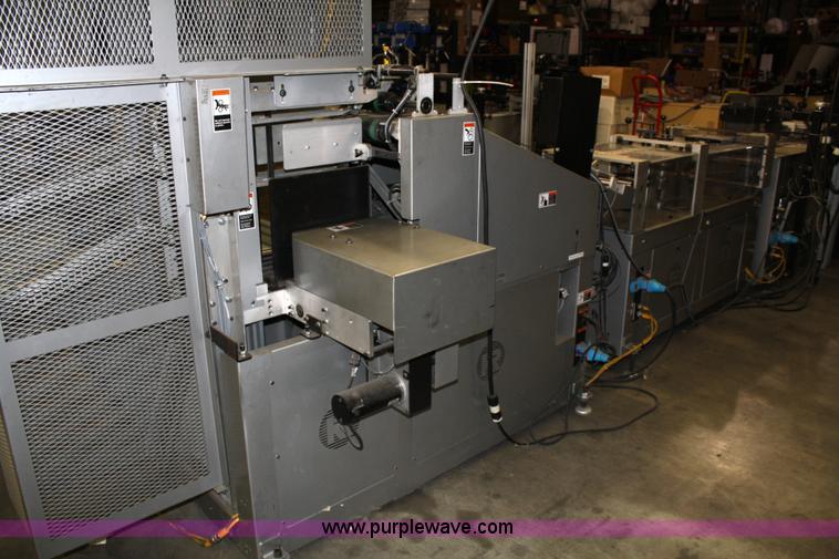 image for item 4899 Kirk-Rudy NetJet inkjet addressing system with dryer/heater, 12" conveyor, quarter folder, ramp stacker and ink management system