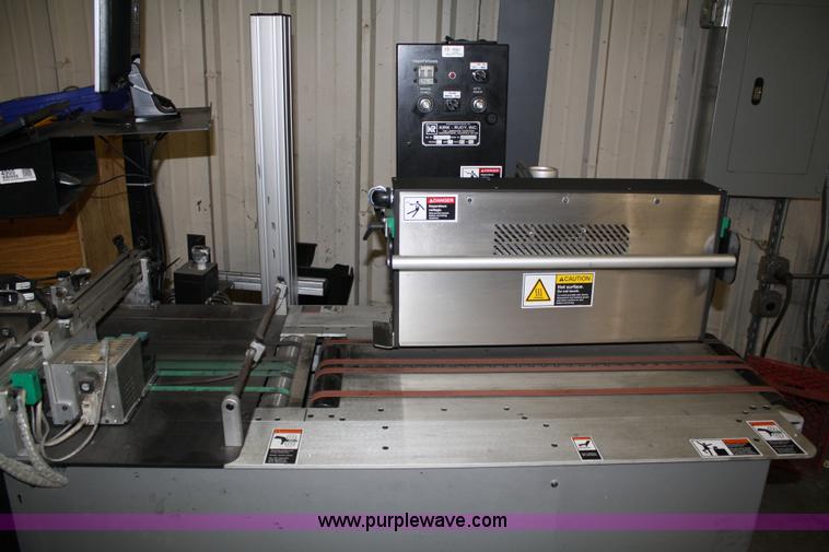 image for item 4900 Kirk-Rudy NetJet inkjet addressing system with 12" conveyor, ramp stacker and ink management system