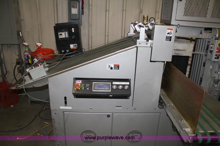 image for item 4900 Kirk-Rudy NetJet inkjet addressing system with 12" conveyor, ramp stacker and ink management system