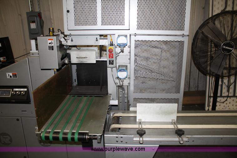 image for item 4900 Kirk-Rudy NetJet inkjet addressing system with 12" conveyor, ramp stacker and ink management system