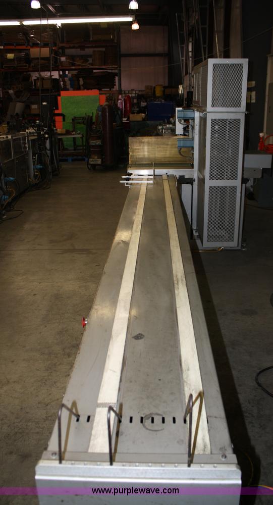 image for item 4900 Kirk-Rudy NetJet inkjet addressing system with 12" conveyor, ramp stacker and ink management system