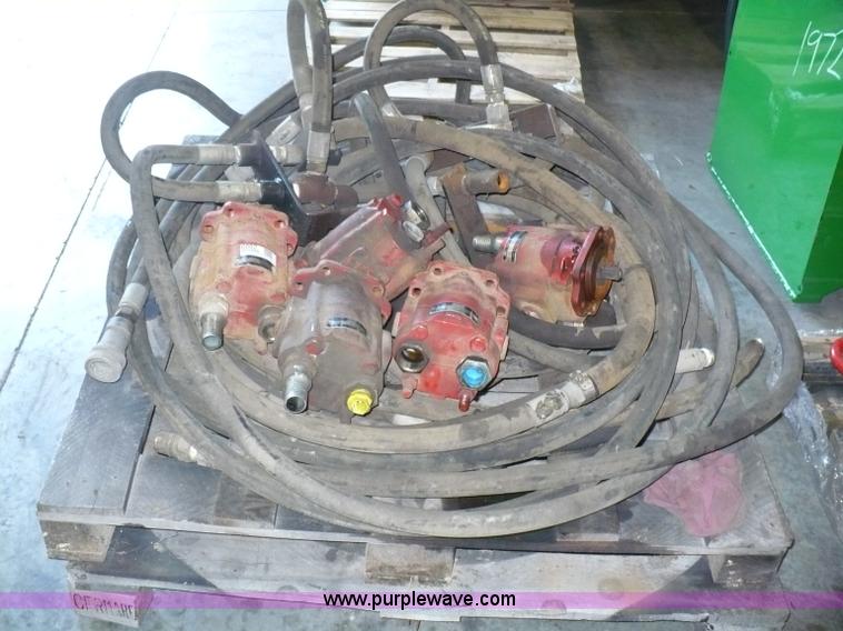 image for item 6002 (5) Muncie pumps and misc. hose with fittings