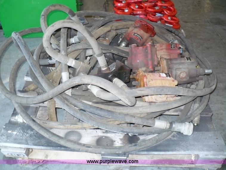 image for item 6002 (5) Muncie pumps and misc. hose with fittings