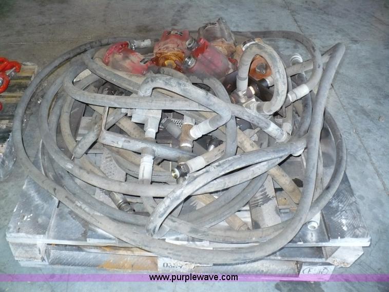 image for item 6002 (5) Muncie pumps and misc. hose with fittings