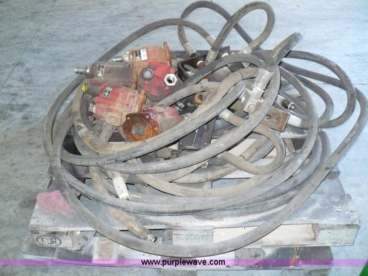 image for item 6002 (5) Muncie pumps and misc. hose with fittings