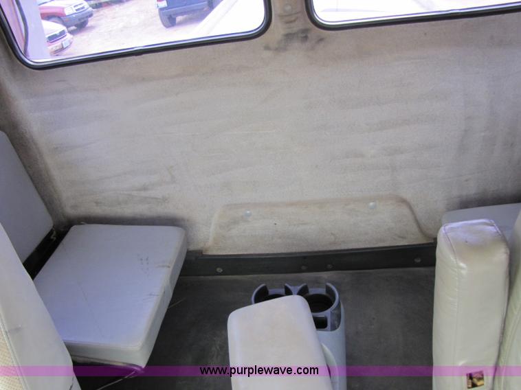 image for item 8432 1998 Freightliner FL60 Rollback truck