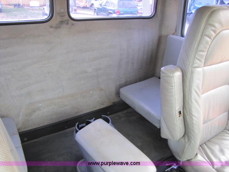 image for item 8432 1998 Freightliner FL60 Rollback truck