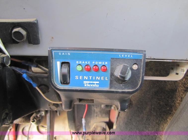 image for item 8432 1998 Freightliner FL60 Rollback truck