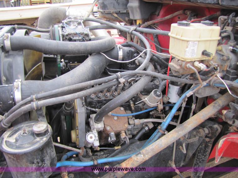 image for item 8432 1998 Freightliner FL60 Rollback truck