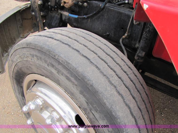 image for item 8432 1998 Freightliner FL60 Rollback truck