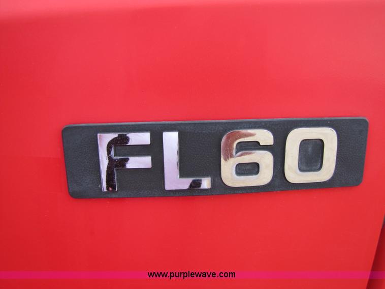 image for item 8432 1998 Freightliner FL60 Rollback truck