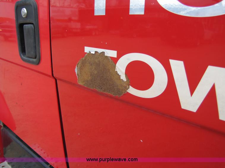 image for item 8432 1998 Freightliner FL60 Rollback truck