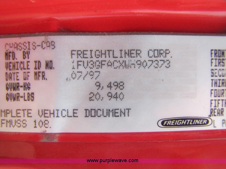 image for item 8432 1998 Freightliner FL60 Rollback truck