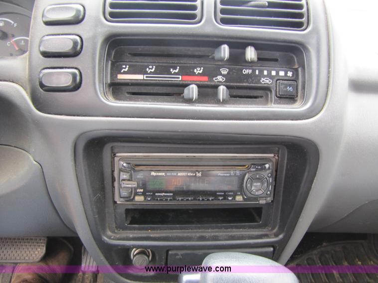 image for item 8436 2000 Chevrolet Tracker convertible SUV