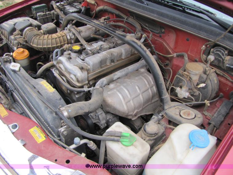 image for item 8436 2000 Chevrolet Tracker convertible SUV