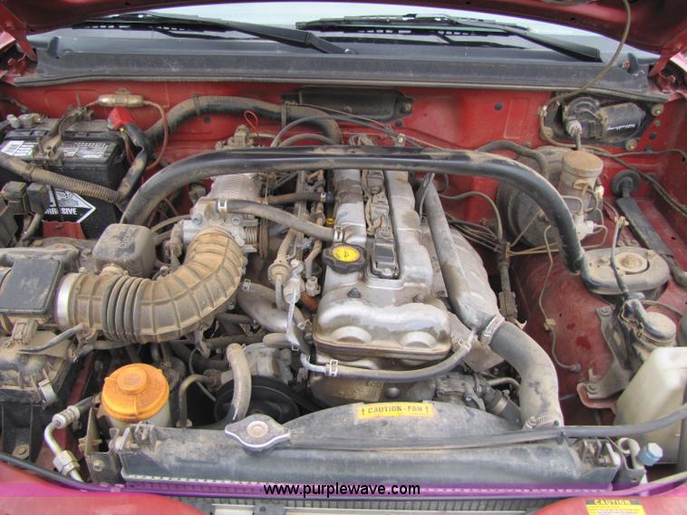 image for item 8436 2000 Chevrolet Tracker convertible SUV