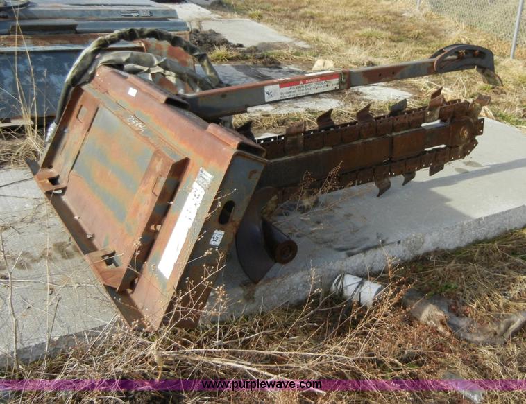 image for item 2094 Bobcat LT303 trencher skid steer attachment