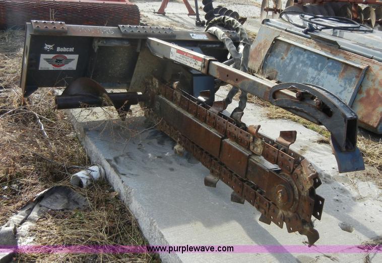 image for item 2094 Bobcat LT303 trencher skid steer attachment