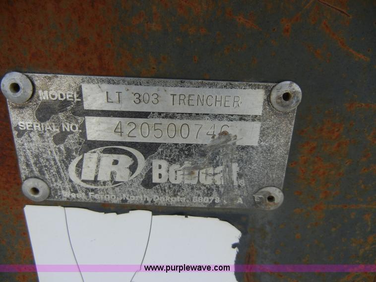 image for item 2094 Bobcat LT303 trencher skid steer attachment