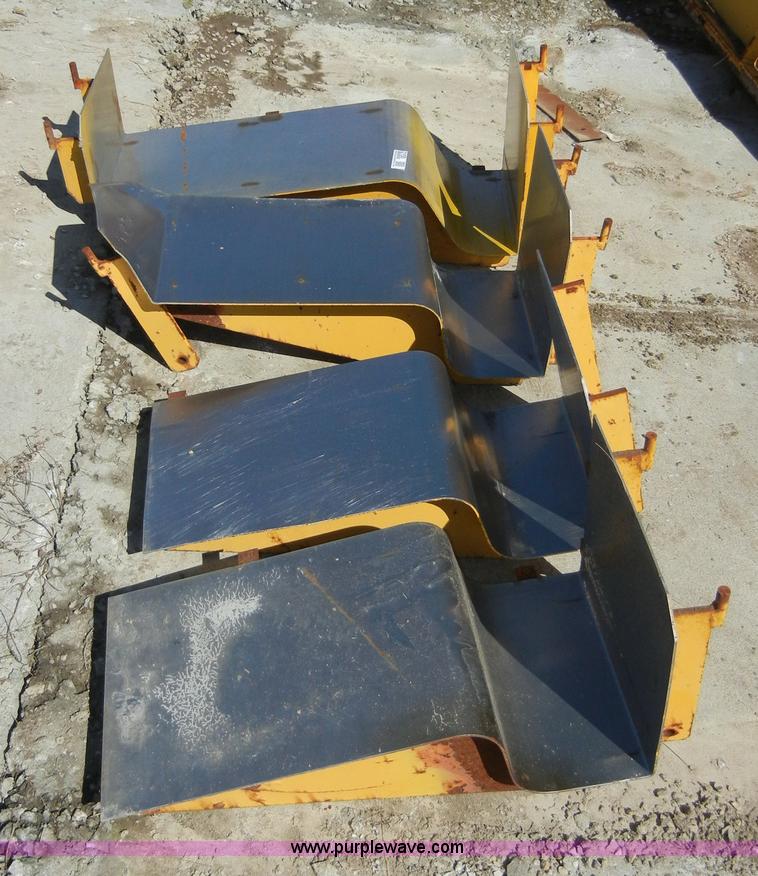 image for item 2150 (4) concrete curb slickers