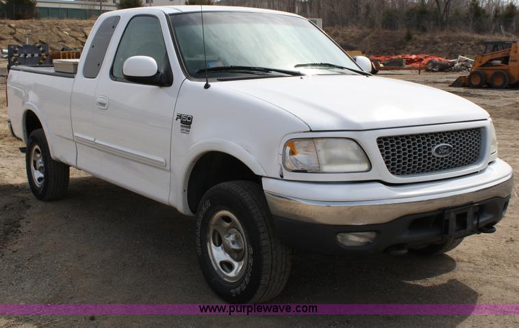image for item 4966 1999 Ford F150 XLT Supercab pickup truck