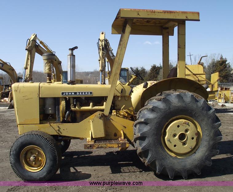 image for item 9562 John Deere 648 tractor with canopy