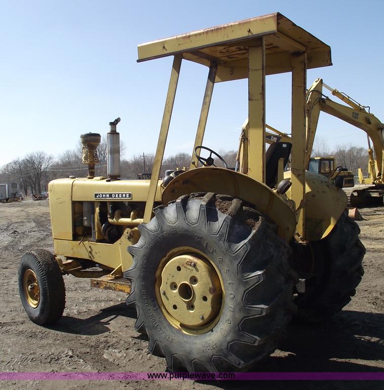 image for item 9562 John Deere 648 tractor with canopy