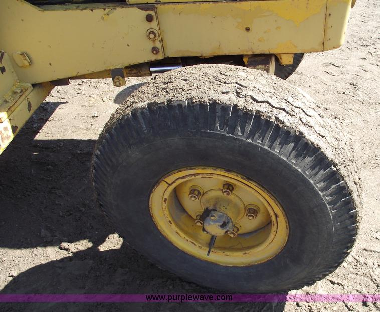image for item 9562 John Deere 648 tractor with canopy