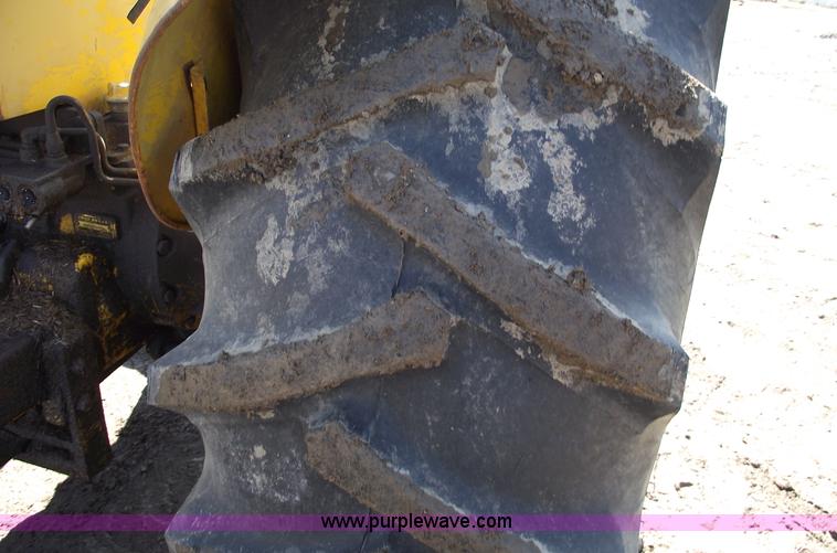 image for item 9562 John Deere 648 tractor with canopy