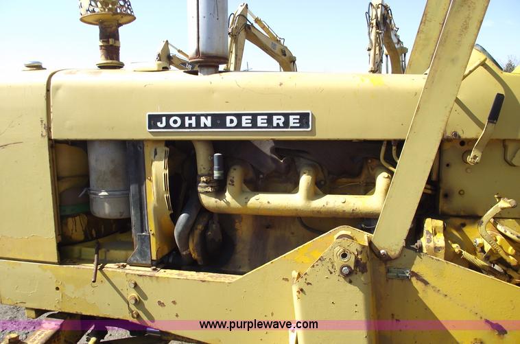 image for item 9562 John Deere 648 tractor with canopy