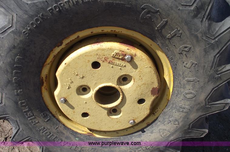 image for item 9562 John Deere 648 tractor with canopy