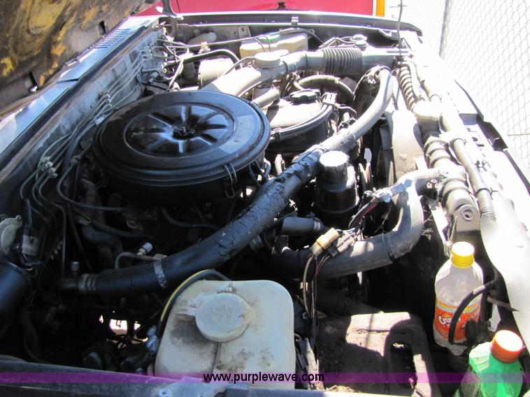 image for item 8559 1985 Nissan GT King Cab pickup truck