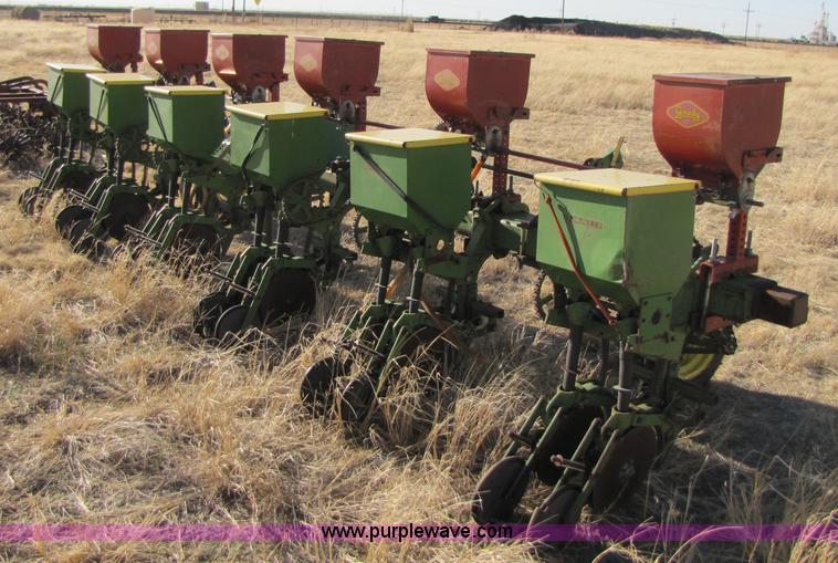 image for item 3469 John Deere planter with Gandy boxes