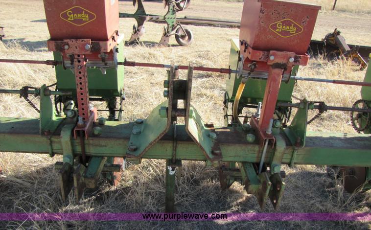 image for item 3469 John Deere planter with Gandy boxes