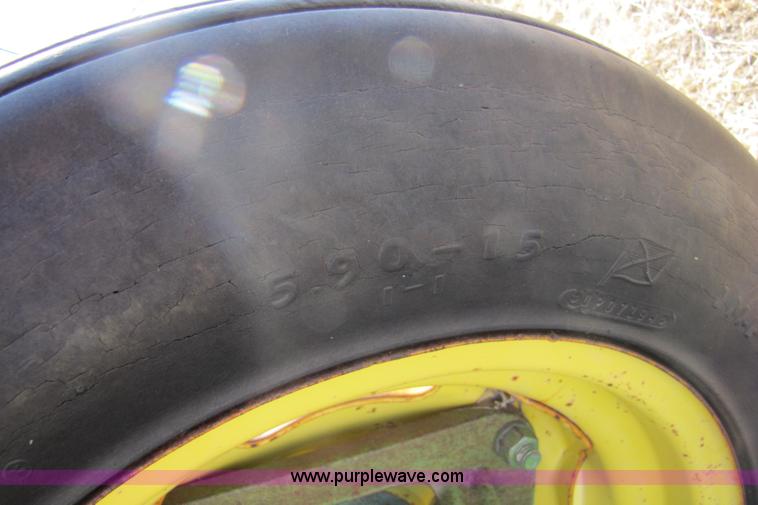 image for item 3469 John Deere planter with Gandy boxes