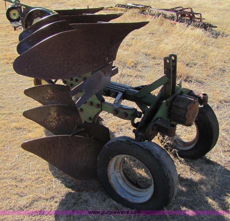 image for item 3470 Three bottom rollover plow