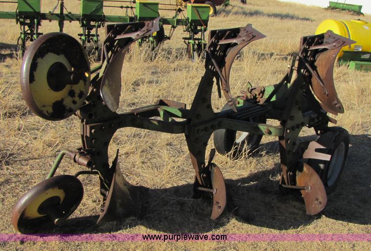image for item 3470 Three bottom rollover plow