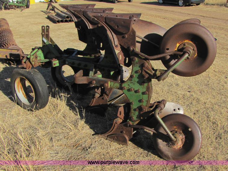 image for item 3470 Three bottom rollover plow