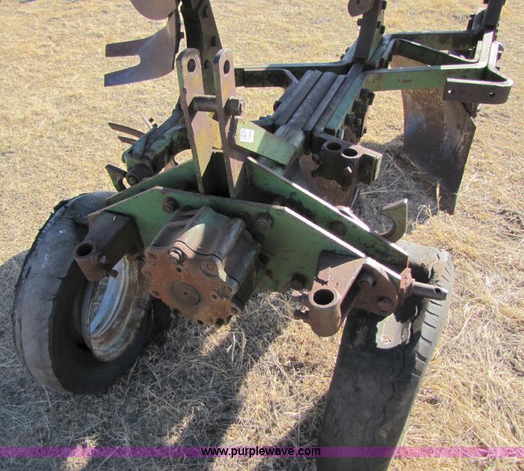 image for item 3470 Three bottom rollover plow