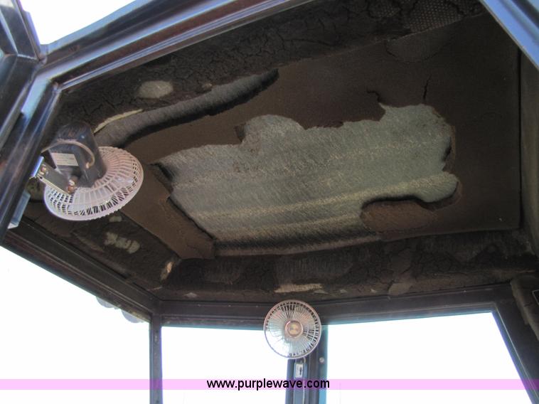 image for item 8744 Hesston 6455 self propelled swather