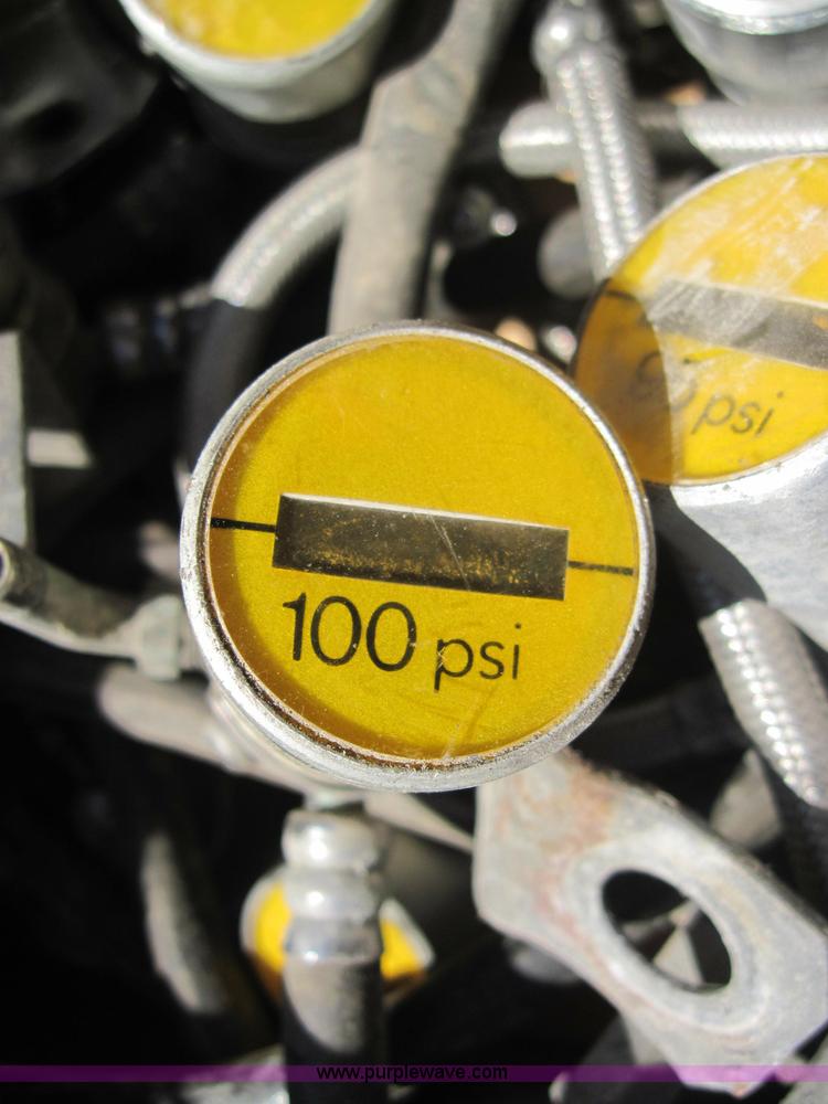 image for item 1967 (23) tire inflation equalizers