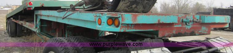 image for item 3830 1969 Freuhauf drop deck semi trailer