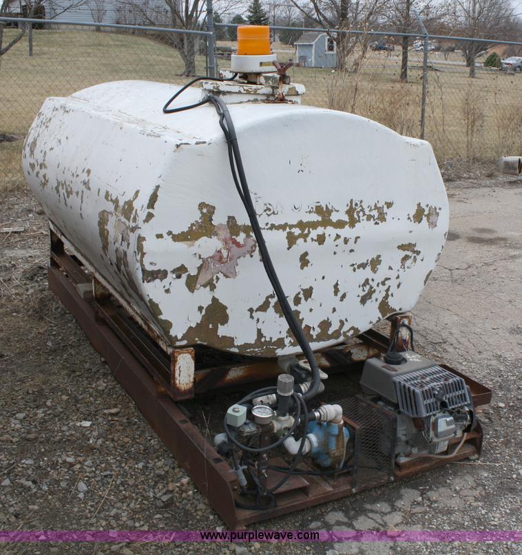 image for item 5054 400 gallon tank with pump on skid