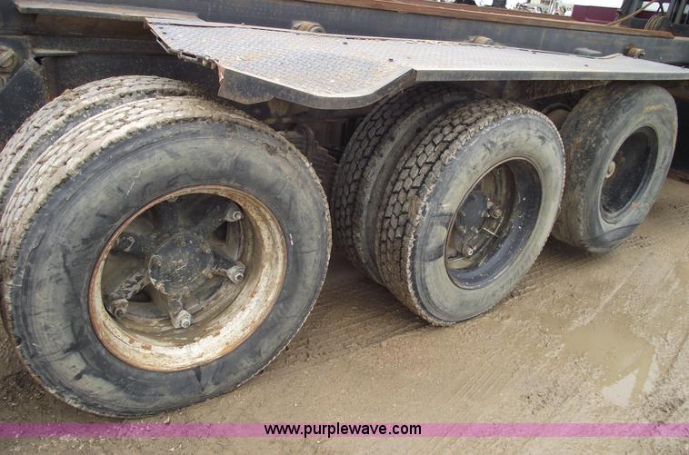 image for item 5761 1987 Mack DM686S roll-off truck