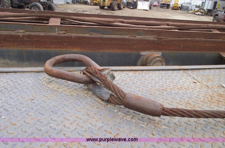 image for item 5761 1987 Mack DM686S roll-off truck