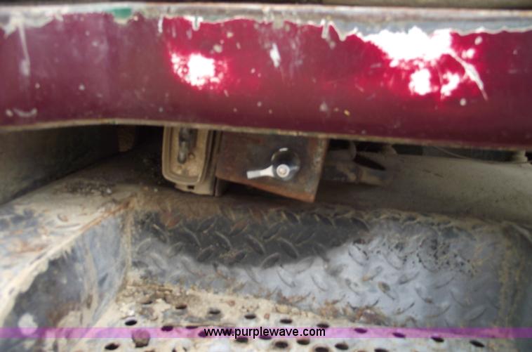 image for item 5761 1987 Mack DM686S roll-off truck