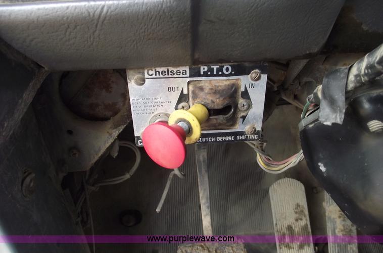 image for item 5761 1987 Mack DM686S roll-off truck